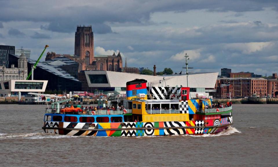 Mersey Ferry in dazzle livery against the backdrop of the Pier Head, Museum of Liverpool, Liverpool Cathedral and Albert Dock