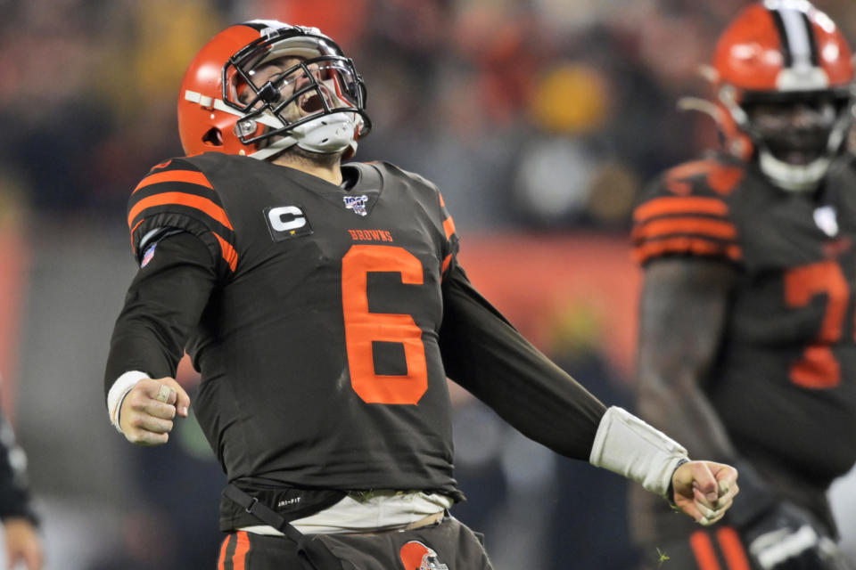 Cleveland Browns quarterback Baker Mayfield celebrates after throwing an 8-yard touchdown pass to tight end Stephen Carlson during the second half of the team's NFL football game against the Pittsburgh Steelers, Thursday, Nov. 14, 2019, in Cleveland. (AP Photo/David Richard)