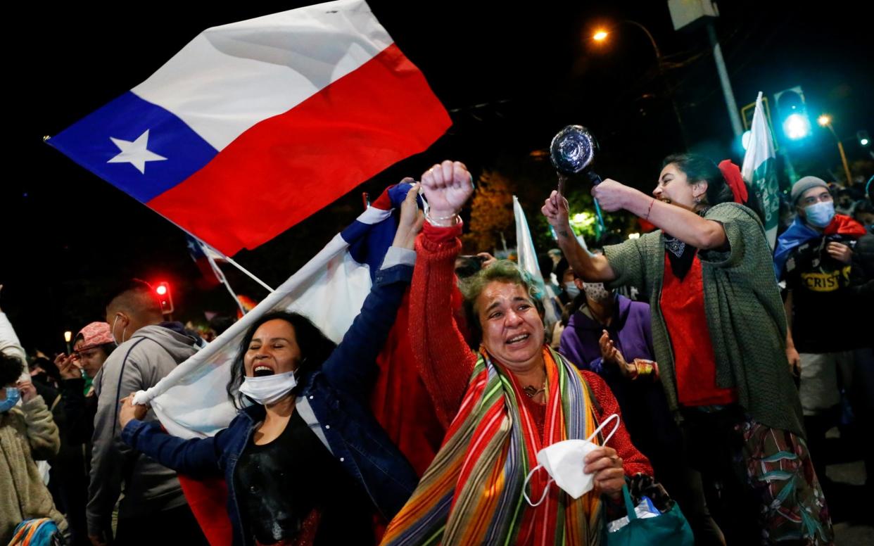 Supporters of the "I Approve" option react after hearing the results of the referendum  - Reuters