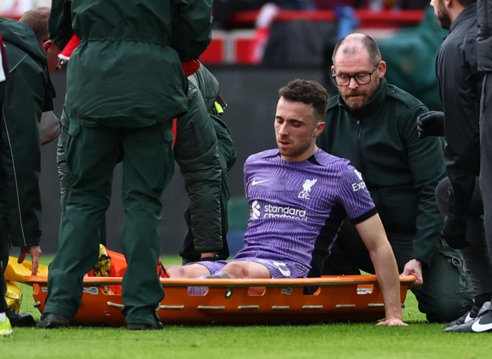 Diogo Jota was stretchered off to add to Liverpool’s injury woes (Action Images/Reuters)