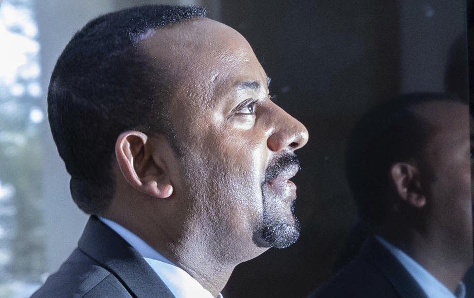 Ethiopian Prime Minister Abiy Ahmed arrives to address members of parliament on the current situation in the country at the Parliament buildings, in Addis Ababa, Ethiopia, Tuesday Oct. 22, 2019. Ethiopia's Nobel Peace Prize-winning prime minister is warning that if there's a need to go to war over a dam project disputed with Egypt his country could ready millions of people, but he says only negotiation can resolve a deadlock. (AP photo Mulugeta Ayene)