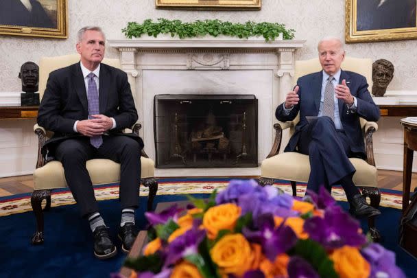 PHOTO: House Speaker Kevin McCarthy looks on as President Joe Biden speaks during a meeting on the debt ceiling, in the Oval Office of the White House in Washington, on May 22, 2023. (Saul Loeb/AFP via Getty Images)