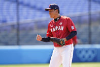 Japan's Ryoji Kuribayashi reacts after Japan won a baseball game against Mexico at Yokohama Baseball Stadium during the 2020 Summer Olympics, Saturday, July 31, 2021, in Yokohama, Japan. (AP Photo/Matt Slocum)