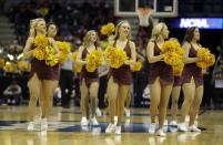 Arizona State cheerleaders perform during the second half of a second-round game between the Texas and the Arizona State in the NCAA college basketball tournament Thursday, March 20, 2014, in Milwaukee. (AP Photo/Morry Gash)