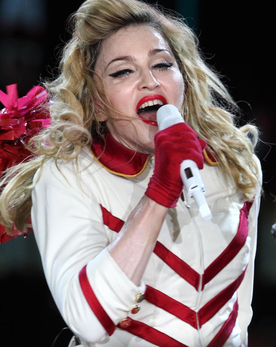 U.S. singer Madonna performs during her concert at Olympic Hall in Moscow, Russia, Tuesday, Aug. 7, 2012. Madonna has voiced hope that three feminist Russian rockers on trial for performing a "punk prayer" against Vladimir Putin are released soon. The pop star told the AP during her concert tour of Russia that she supports freedom of speech and hopes the judge will show leniency. (AP Photo/Mikhail Metzel)