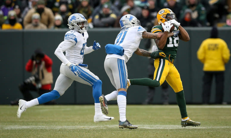 Randall Cobb catches a pass for the Green Bay Packers against the Detroit Lions.