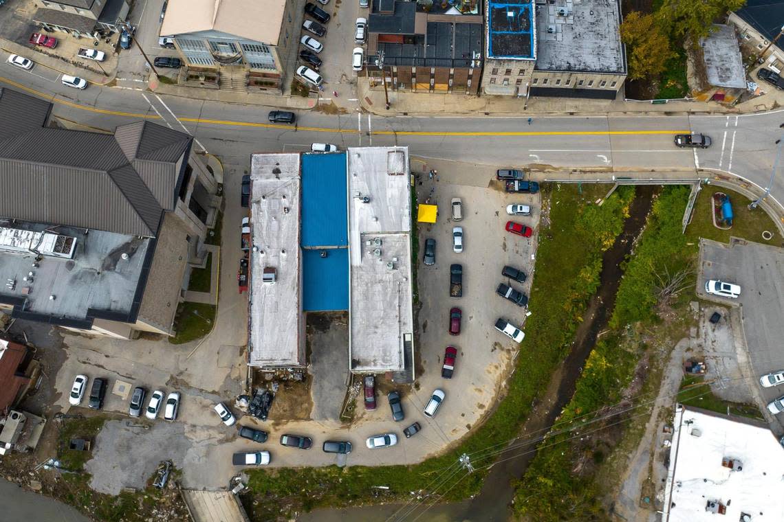 Vehicles line up for lunch in downtown Hindman, Ky., on Monday, Oct. 17, 2022.