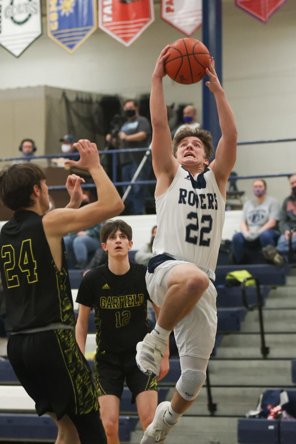 Rootstown junior Brandan Nicholas with a shot during Tuesday night’s game against Garfield High School.