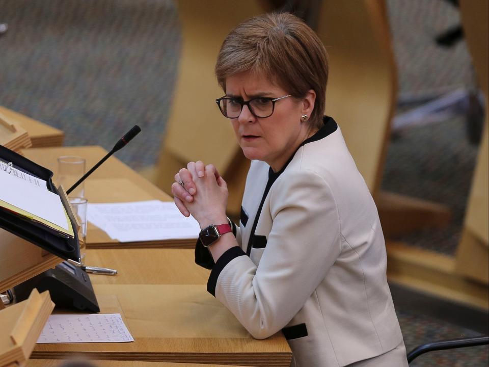 <p>Nicola Sturgeon at first minister’s questions in the Scottish parliament on Thursday </p> (Getty)