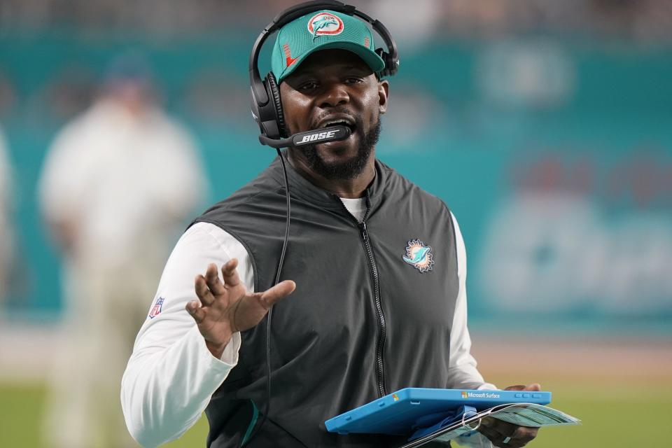 Miami Dolphins head coach Brian Flores directs his team during the second half against the New England Patriots on Jan. 9.