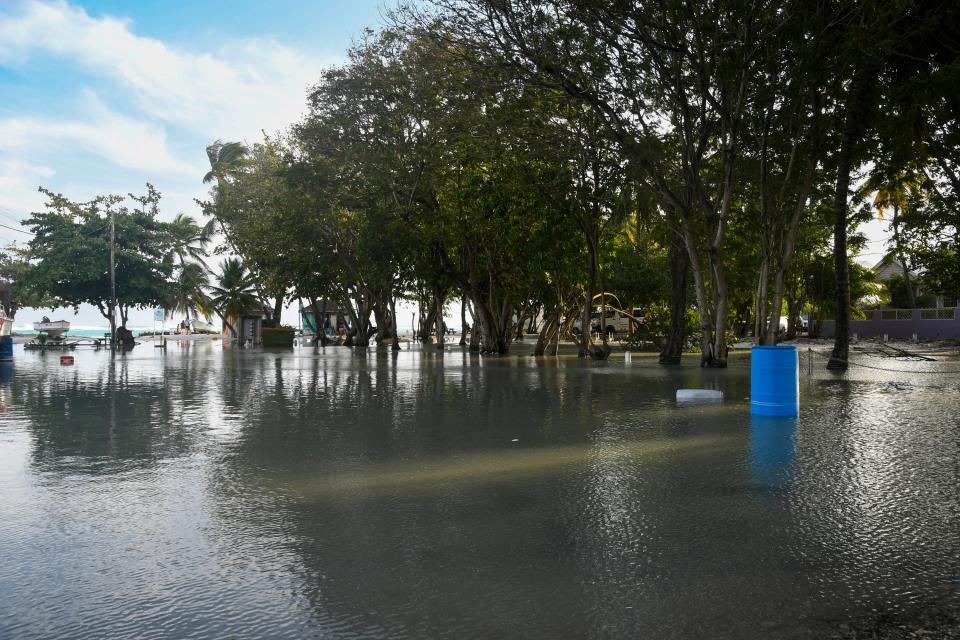 A flooded parking lot is seen after the passing of Hurricane Beryl in Worthing, Christ Church, Barbados (AFP via Getty Images)