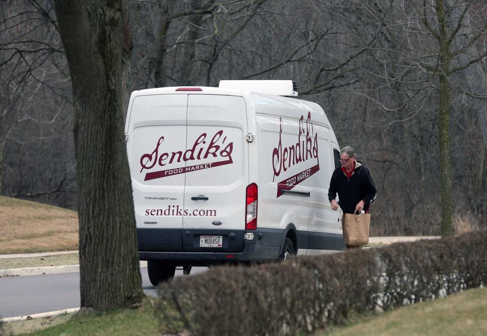 A Sendiks's delivery is made on Ridge Blvd. in Wauwatosa on Monday, March 30, 2020. A high demand of grocery deliveries have increased during the coronavirus pandemic.
