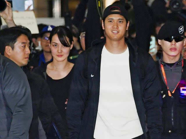 <p>Kyodo/AP</p> Shohei Ohtani and Mamiko Tanaka arrive at Incheon airport on March 15, 2024 ahead of the two-game, season-opening series against the San Diego Padres.