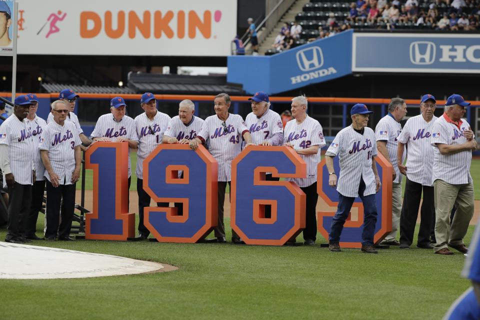 The 1969 mets leave the field after a pre-game ceremony to honor them before a baseball game against the Atlanta Braves Saturday, June 29, 2019, in New York. (AP Photo/Frank Franklin II)