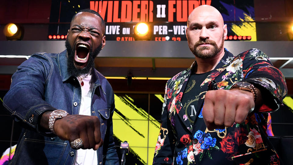 Seen here, Deontay Wilder and Tyson Fury pose for photos ahead of their rematch in Las Vegas.