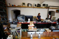 Austrian Apple computer collector Roland Borsky stands in his office in Vienna, Austria September 28, 2018. REUTERS/Leonhard Foeger