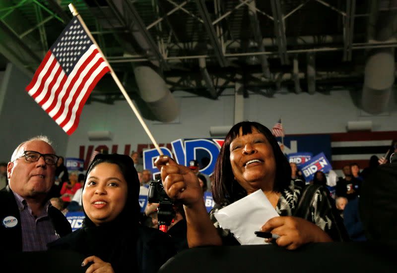 Supporters listen to Democratic U.S. presidential candidate and former Vice President Biden at his South Carolina primary night rally in Columbia