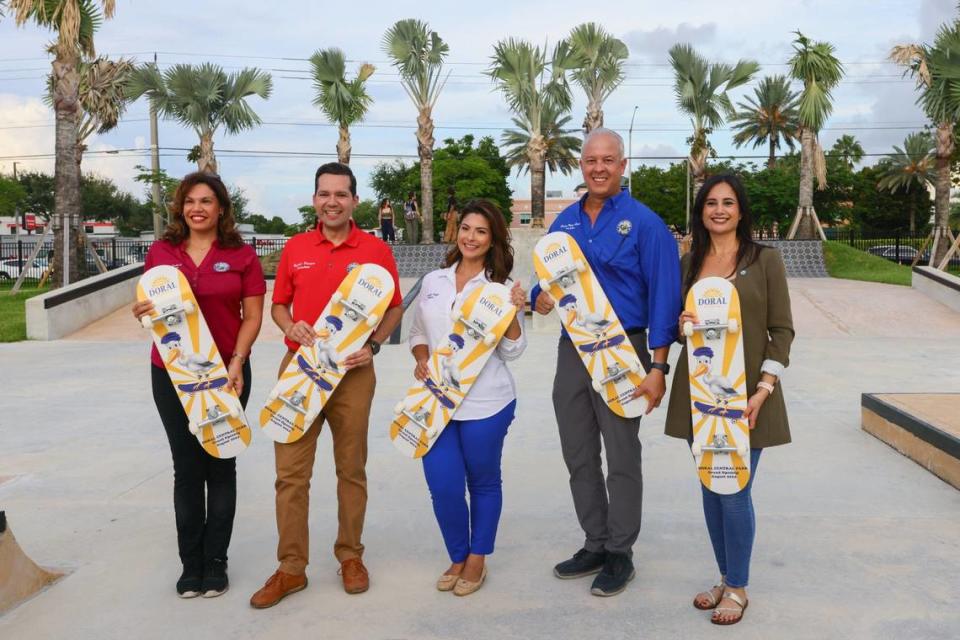 From left: Doral Councilwoman Digna Cabral, Councilman Rafael Pineyro, Mayor Christi Fraga, Vice Mayor Oscar Puig-Corve and Councilwoman Maureen Porras hold skateboards at the skate park during the inauguration of the eastern portion of Doral Central Park at 3005 NW 92nd Ave. in Doral, Florida, on Monday, Aug. 26, 2024.