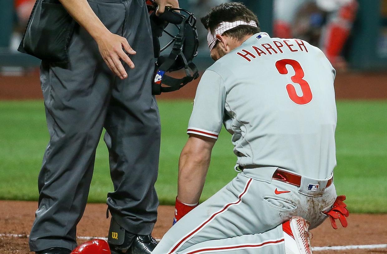 ST LOUIS, MO - APRIL 28: Umpire Chris Segal #96 looks at Bryce Harper #3 of the Philadelphia Phillies after he was hit by pitch during the sixth inning against the St. Louis Cardinals at Busch Stadium on April 28, 2021 in St Louis, Missouri. (Photo by Scott Kane/Getty Images)