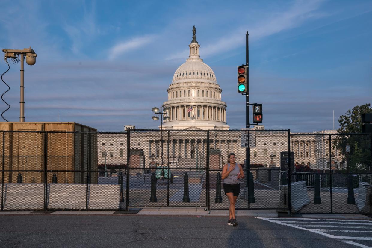 Capitol Breach Fence (Copyright 2021 The Associated Press. All rights reserved)