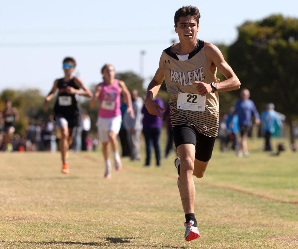 Abilene High's Karter Batten competes in the 5,000 meter run during the District 4-5A cross country meet.