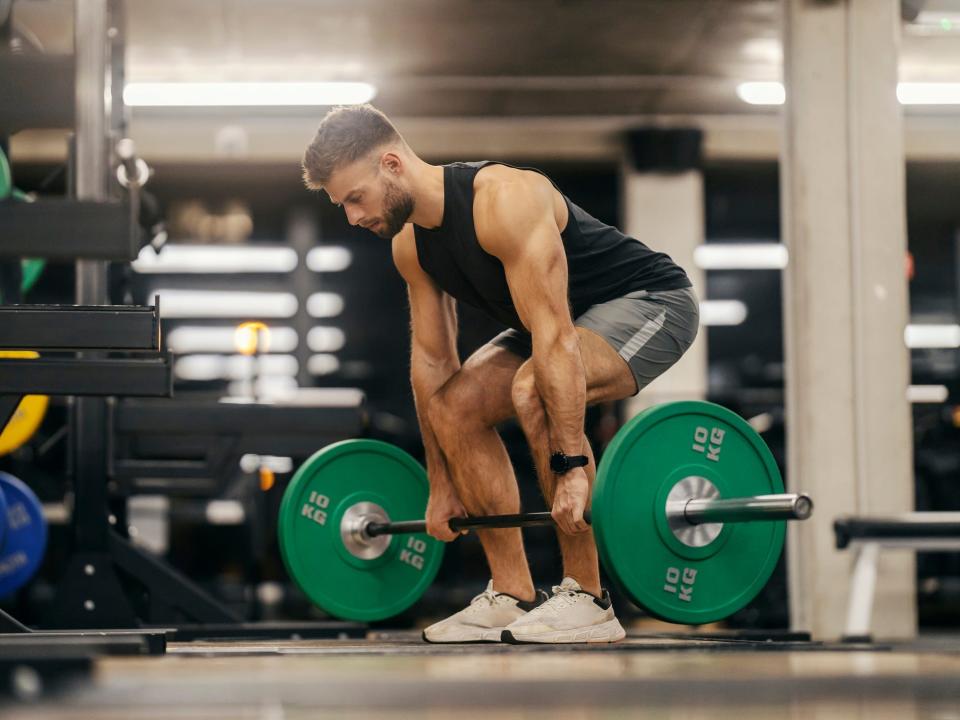 Man deadlifting