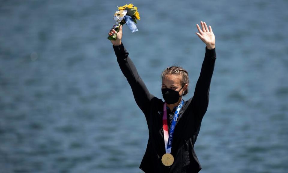 Gold medalist Lisa Carrington celebrates at the medal ceremony.