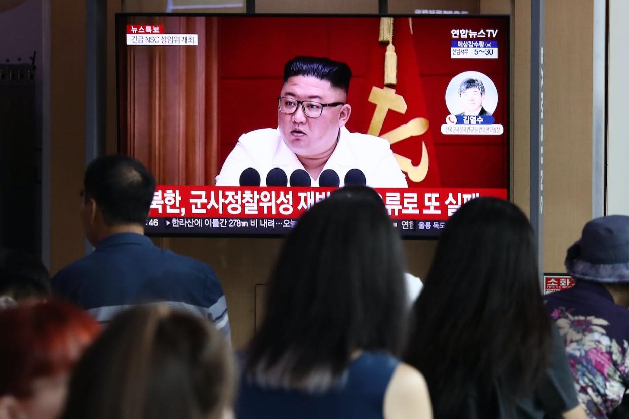 North Korean leader Kim Jong Un on a screen at the Seoul Railway Station on Aug. 24, 2023. <a href="https://www.gettyimages.com/detail/news-photo/people-watch-a-television-broadcast-showing-a-file-image-of-news-photo/1634983526?adppopup=true" rel="nofollow noopener" target="_blank" data-ylk="slk:Chung Sung-Jun/Getty Images;elm:context_link;itc:0;sec:content-canvas" class="link ">Chung Sung-Jun/Getty Images</a>