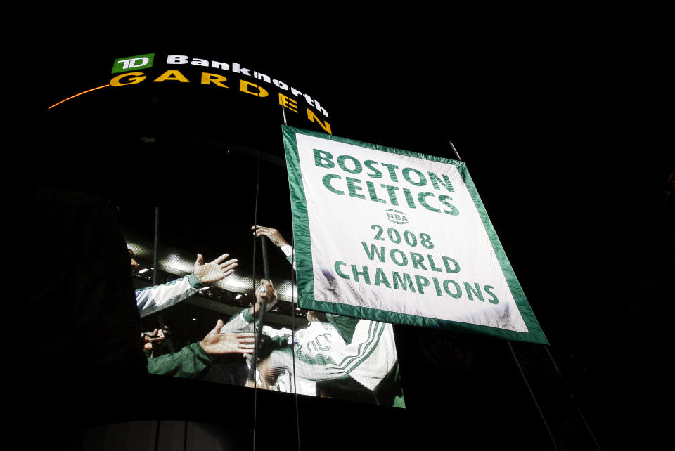 The Boston Celtics 2008 championship banner is raised to the rafters prior to their basketball game against the <a class="link " href="https://sports.yahoo.com/nba/teams/cleveland/" data-i13n="sec:content-canvas;subsec:anchor_text;elm:context_link" data-ylk="slk:Cleveland Cavaliers;sec:content-canvas;subsec:anchor_text;elm:context_link;itc:0">Cleveland Cavaliers</a> in Boston, Tuesday, Oct. 28, 2008. (AP Photo/Winslow Townson)