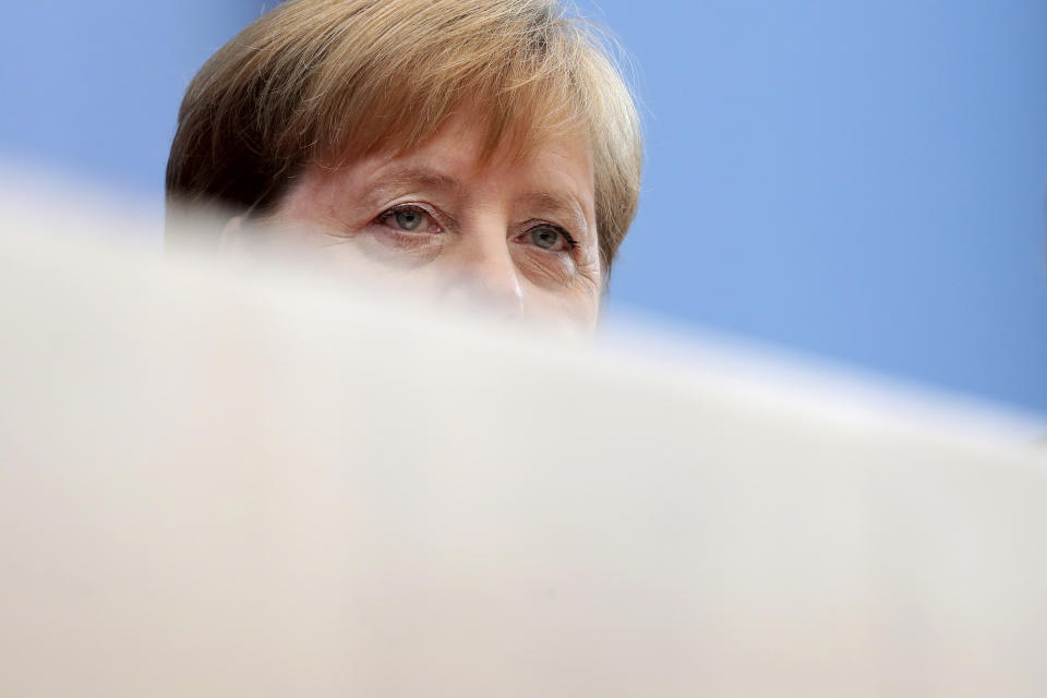 German Chancellor Angela Merkel addresses the media during her annual sommer press conference in Berlin, Germany, Friday, July 19, 2019. (AP Photo/Michael Sohn)