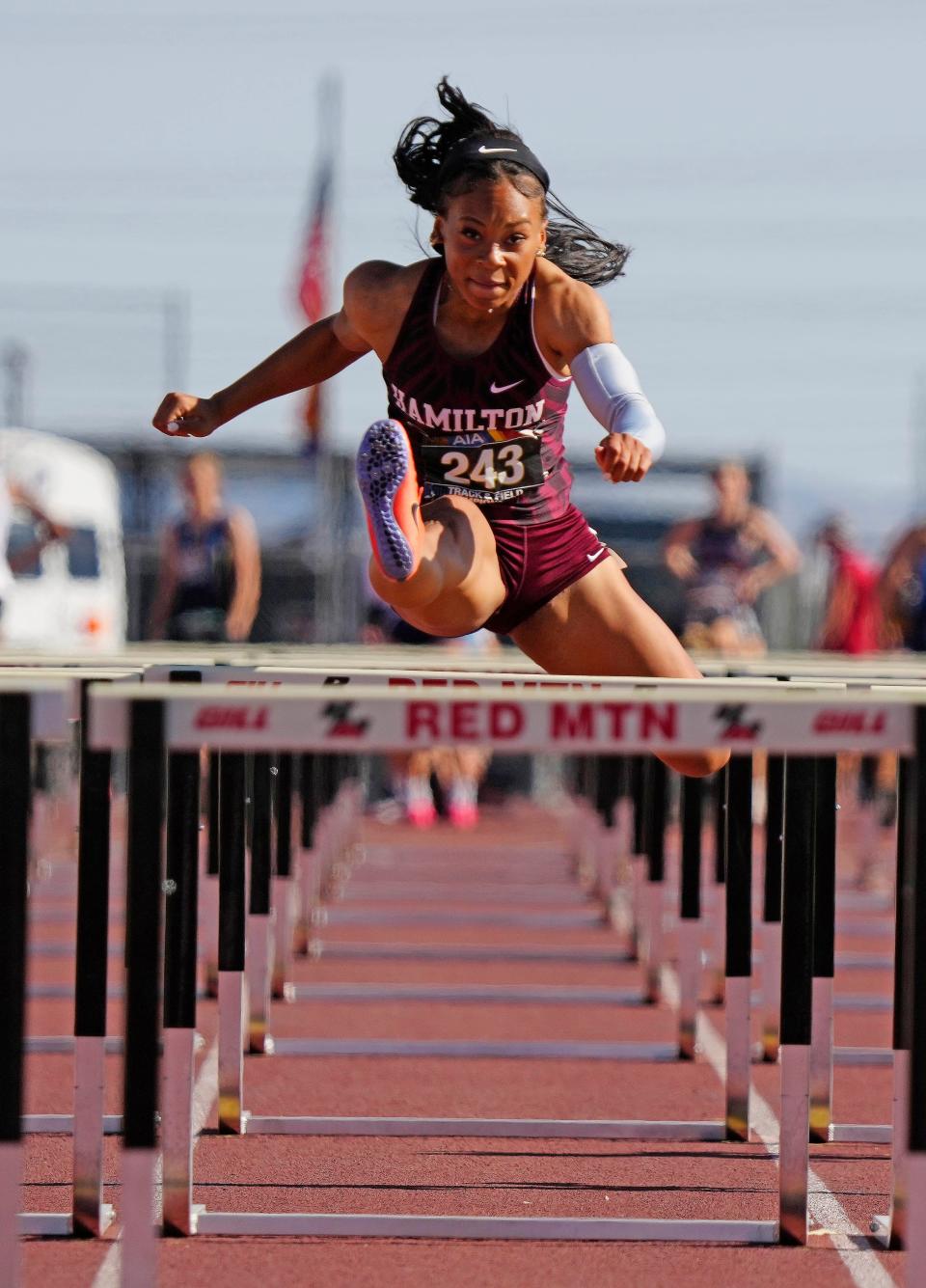 Hamilton's Kori Martin wins the 100-meter hurdles during the track and field championships at Red Mountain High School in Mesa on May 6, 2023.