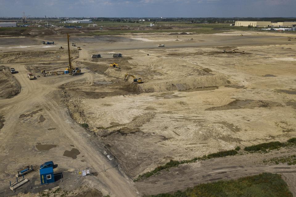 Construction is underway of a battery factory for electric vehicles built by China-based Contemporary Amperex Technology Co. Limited (CATL) in Debrecen, Hungary on Tuesday, May 23, 2023. Residents, environmentalists and opposition politicians are worried that the factory will exacerbate existing environmental problems and use up the country's precious water supplies. (AP Photo/Denes Erdos)