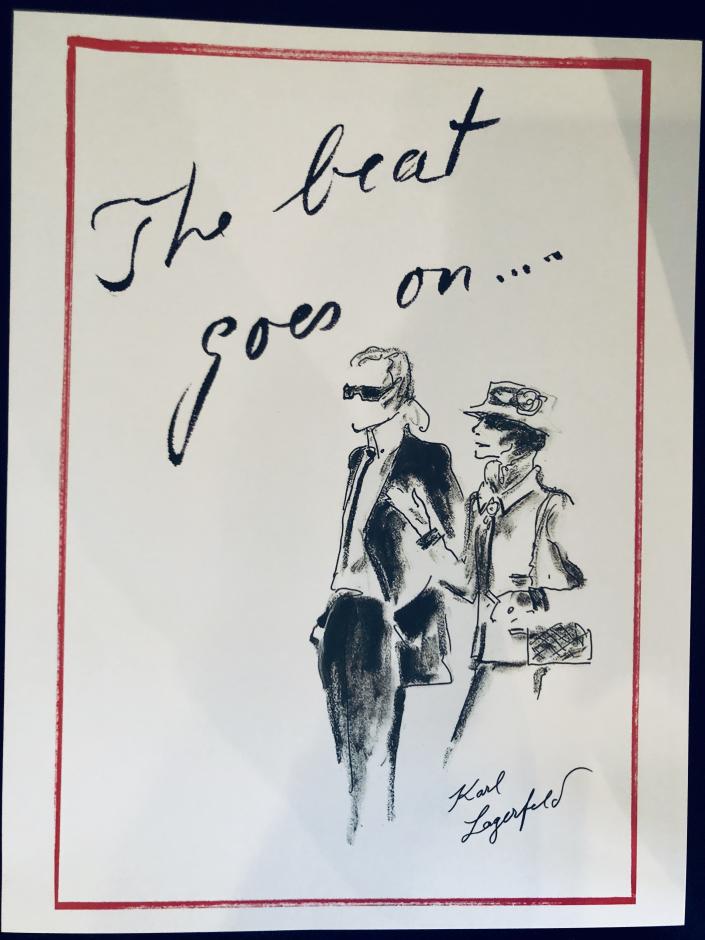 Lagerfeld’s sketch reading “The beat goes on…”