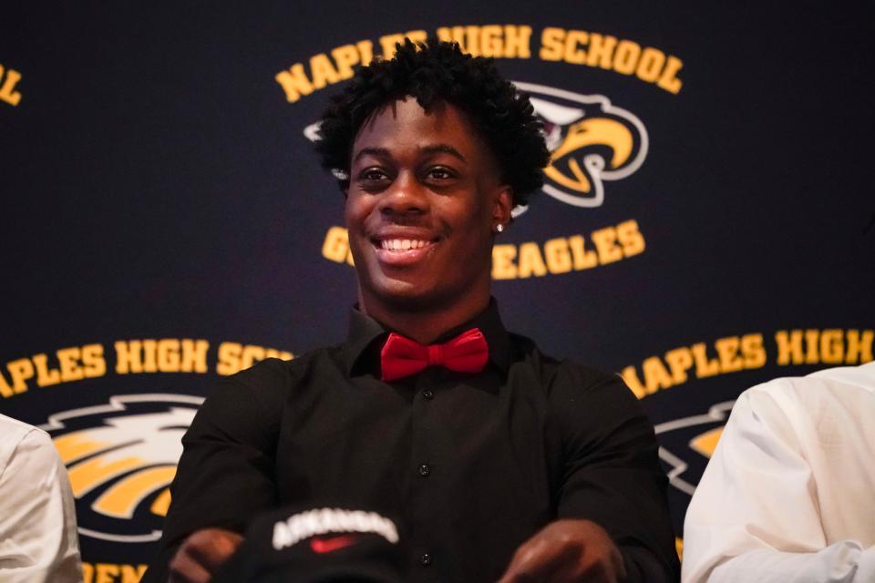 Naples running back Isaiah Augustave smiles during an early signing celebration at Naples High School in Naples on Thursday, Dec. 15, 2022. 