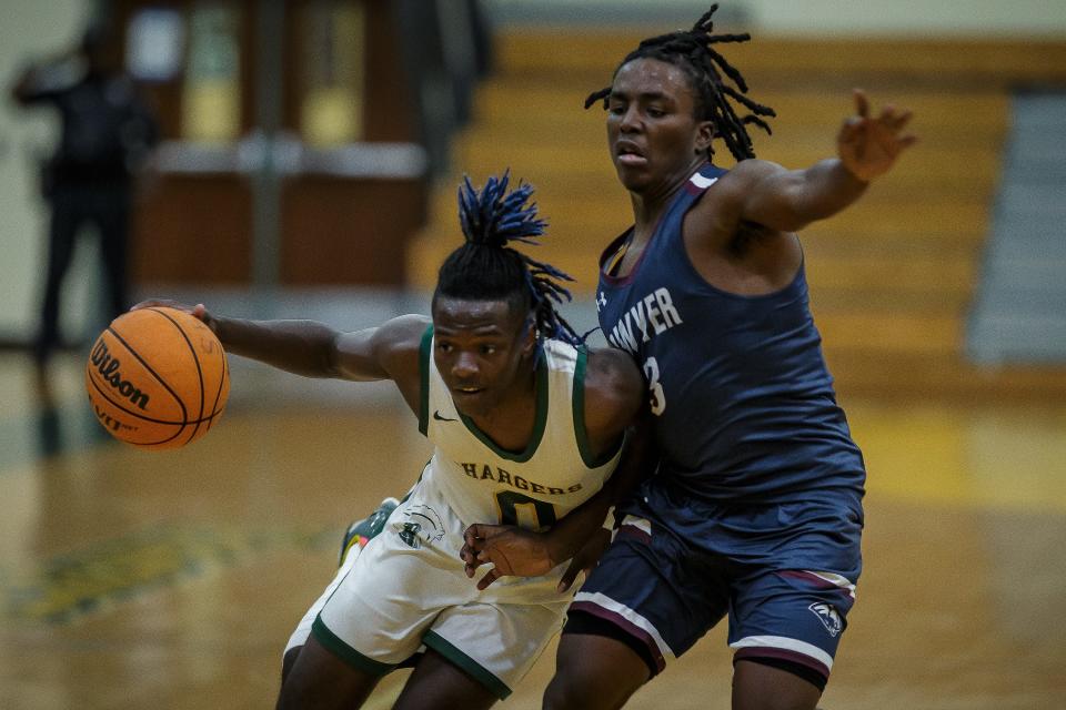 The Suncoast Community High School Chargers hosted the William T. Dwyer High School Panthers in boys high school basketball action in Riviera Beach, Fla., on January 25, 2023. Dwyer won 46-45 over Suncoast.
