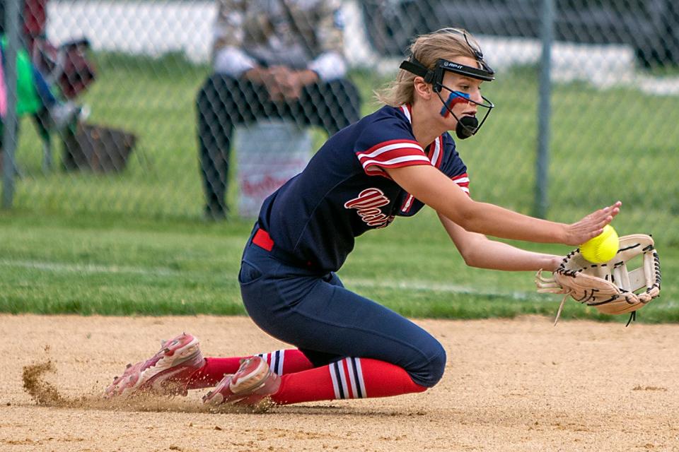 West Central second baseman Brynna Seitz makes a sliding catch of a soft line drive during the Heat's 1-0 eight inning win over the Comets of Sterling Newman in Class 1A sectional semifinal action in Williamsfield on Tuesday, May 24, 2022.