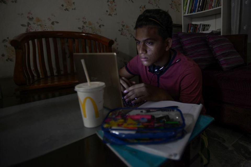 A student takes online lessons during phase three of the movement control order in Shah Alam April 15, 2020. — Picture by Miera Zulyana