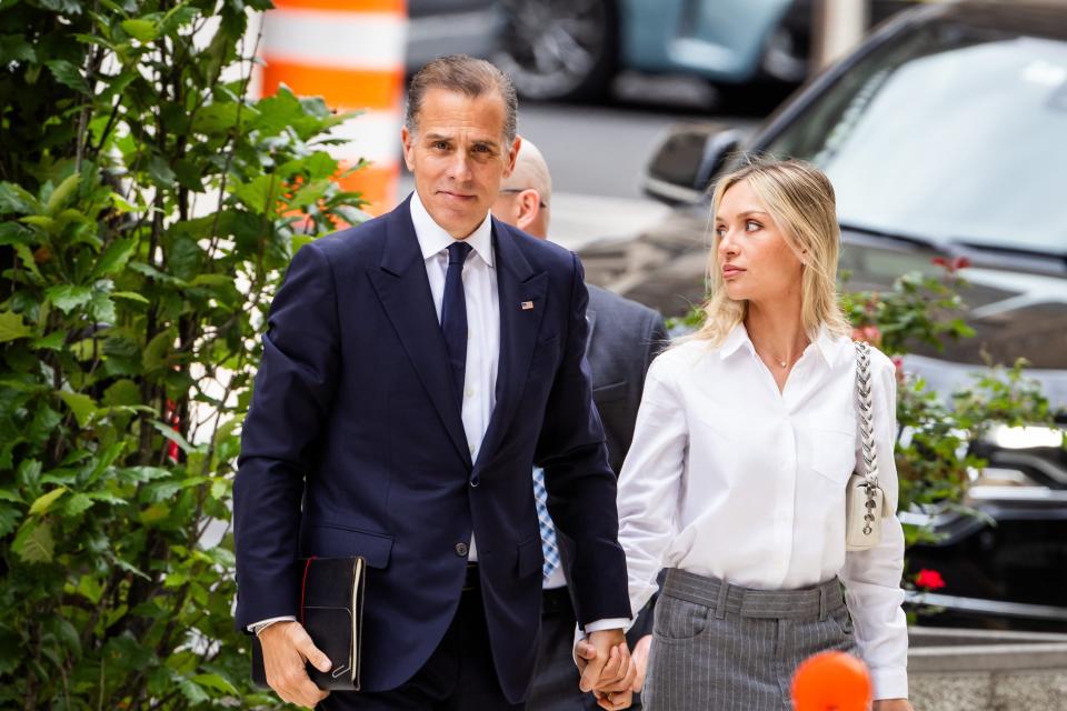 Hunter Biden and his wife Melissa Cohen Biden arrive for the second day of jury deliberations in his federal gun trial at the US Federal District Court in Wilmington, Delaware, USA, 11 June 2024 (EPA)