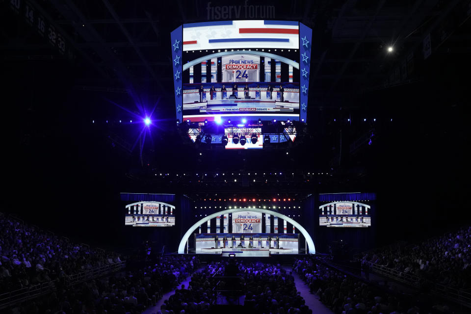 FILE - Republican presidential candidates, from left, former Arkansas Gov. Asa Hutchinson, former New Jersey Gov. Chris Christie, former Vice President Mike Pence, Florida Gov. Ron DeSantis, businessman Vivek Ramaswamy, former U.N. Ambassador Nikki Haley, Sen. Tim Scott, R-S.C., and North Dakota Gov. Doug Burgum stand on stage during a Republican presidential primary debate hosted by FOX News Channel Wednesday, Aug. 23, 2023, in Milwaukee. (AP Photo/Morry Gash, File)