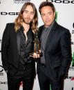 <p>Leto’s <em>“Black and White”</em> co-star Downey presents him with the Breakthrough Actor award for his work in <em>“Dallas Buyers Club”</em> in 2013. (Photo: Steve Granitz/WireImage)</p>