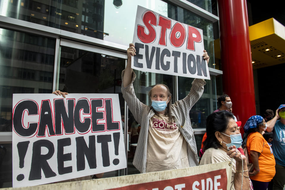 FILE - In this Aug. 4, 2021, file photo, housing advocates protest on the eviction moratorium in New York. The Supreme Court is allowing evictions to resume across the United States, blocking the Biden administration from enforcing a temporary ban that was put in place because of the coronavirus pandemic. Roughly 3.5 million people in the United States said they faced eviction in the next two months, according to Census Bureau data from early August. (AP Photo/Brittainy Newman, File)