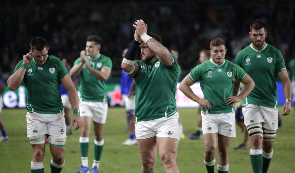 Ireland players celebrate after defeating Samoa 47-5 in their Rugby World Cup Pool A game at Fukuoka Hakatanomori Stadium in Fukuoka, Japan, Saturday, Oct. 12, 2019. (AP Photo/Aaron Favila)