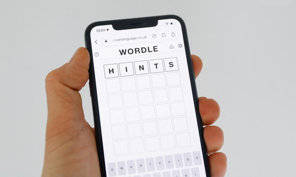 Wordle, a website-only word game played on mobile phones and tablets, is displayed in this picture illustration taken February 1, 2022. REUTERS/Andrew Boyers/Illustration
