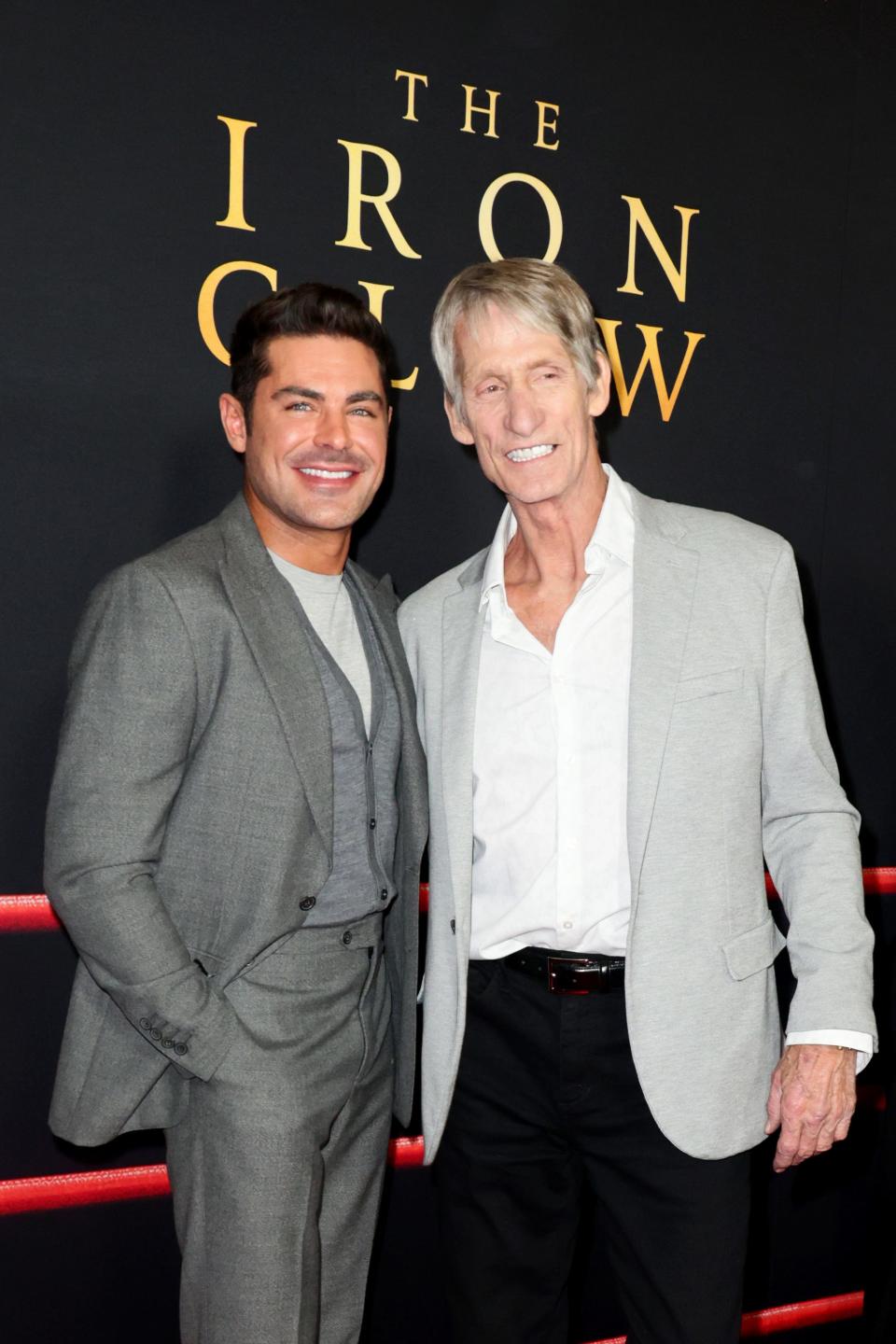 Zac Efron (left) and the real Kevin Von Erich attend the Hollywood premiere of "The Iron Claw."