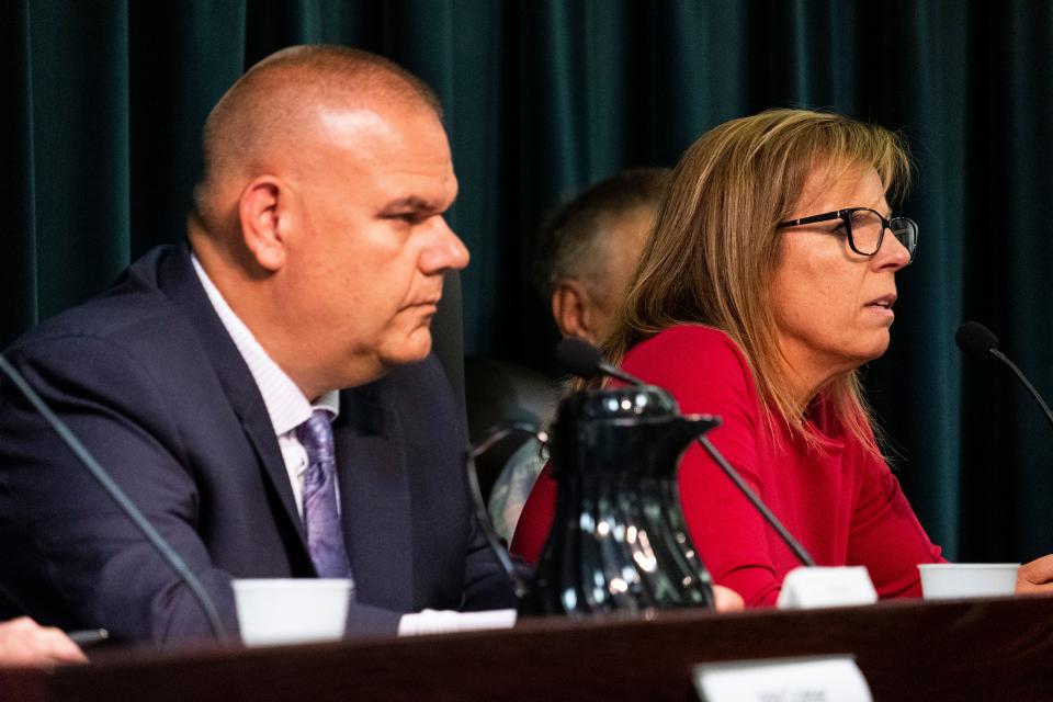 Marysville City Council candidate Mike Deising, left, listens to Kathleen Hayman give her opening remarks during a candidate forum Thursday, Aug. 22, 2019, at Marysville City Hall. Hayman, a current councilmember, is hoping to be reelected.