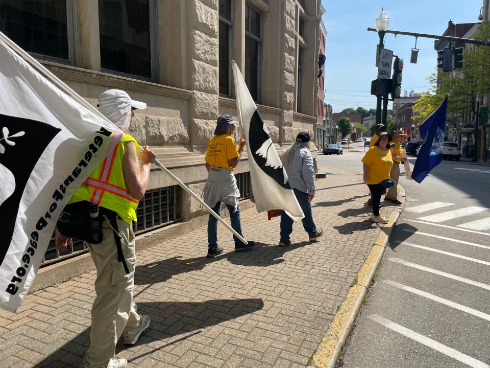 Veterans for Peace marching through downtown Norwich, after meeting with Congressman Joe Courtney's staff Monday. They want the fighting to end in Gaza and the West Bank, and to end the U.S.'s military funding for Israel.