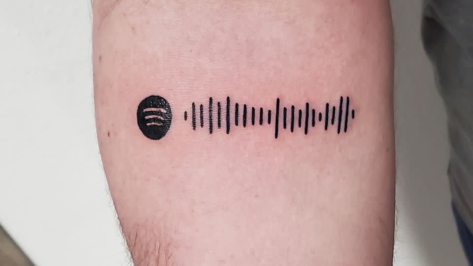 The above ink, on the forearm of tattooer John Lapides' first Spotify tattoo customer, leads to the Michael Bublé song "Everything." - John Lapides/Spray Day Tattoos