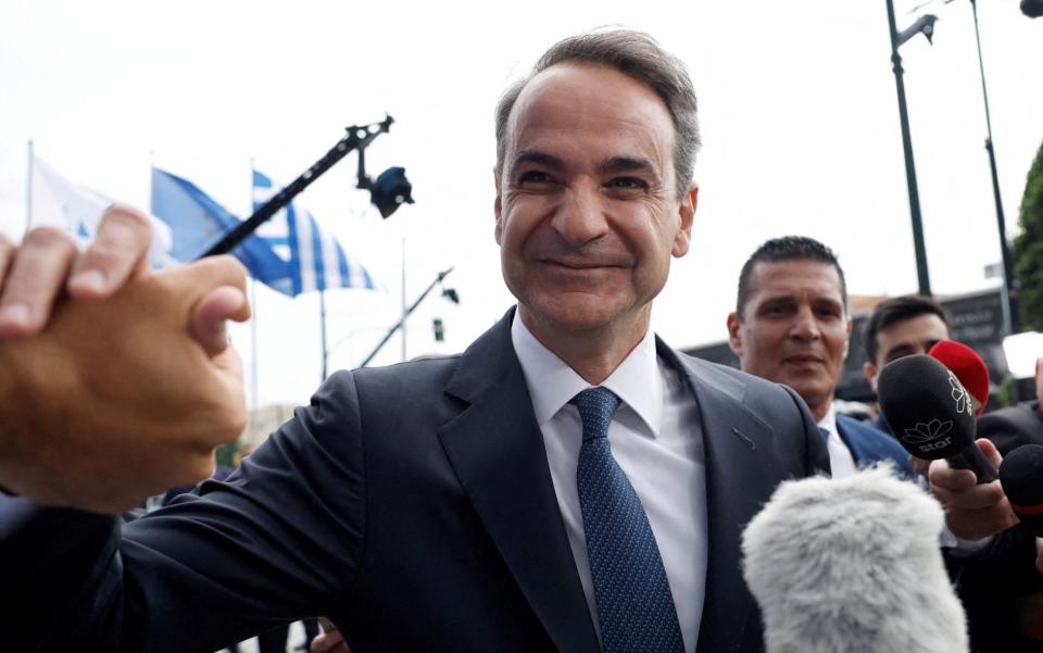 Kyriakos Mitsotakis, the Prime Minister of Greece and leader of the New Democracy conservative party, arrives at the party's headquarters - LOUIZA VRADI