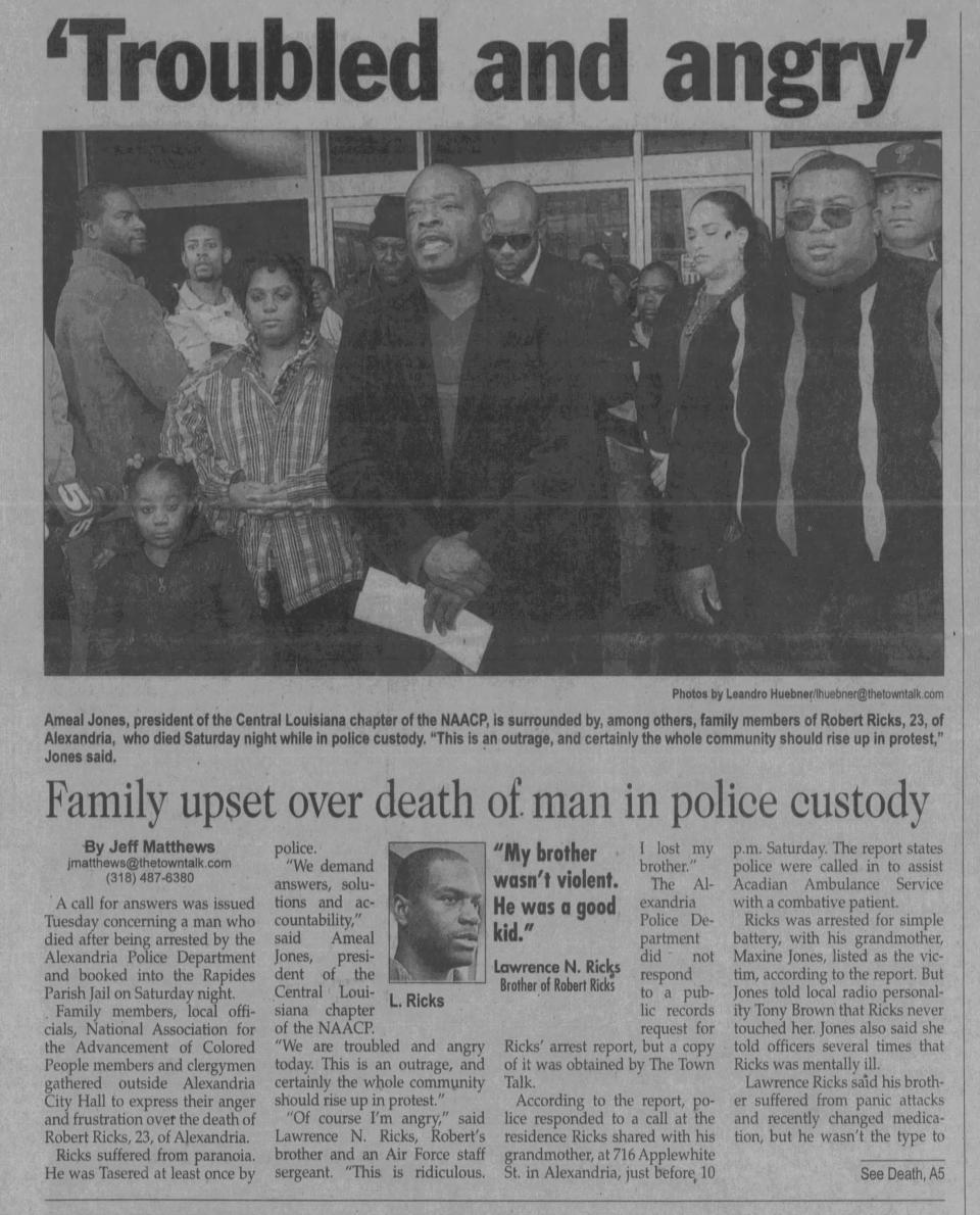 This Feb. 9, 2011, article shows Robert Ricks' family and others speaking days after Ricks' death in police custody.