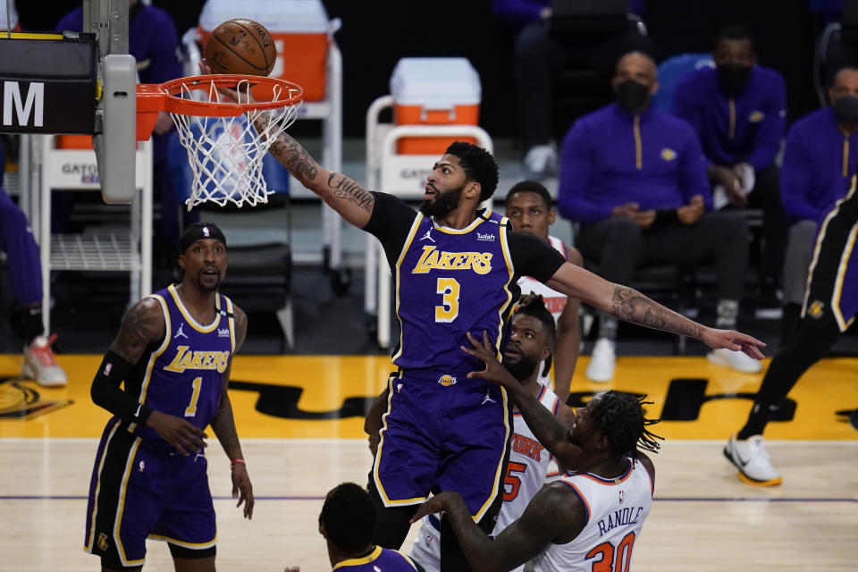 Los Angeles Lakers forward Anthony Davis (3) shoots against the New York Knicks during the first quarter of a basketball game Tuesday, May 11, 2021, in Los Angeles. (AP Photo/Ashley Landis)